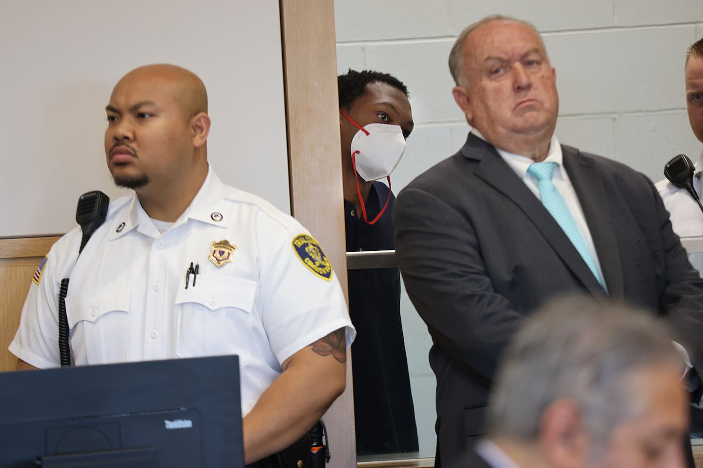 Trevor Bady, 21, in mask, was arraigned in Lowell District Court in June  the killing of Ahliana M. Dickey, the 15 year old girl who was found dead of gunshot wounds on the day of her eighth grade graduation.