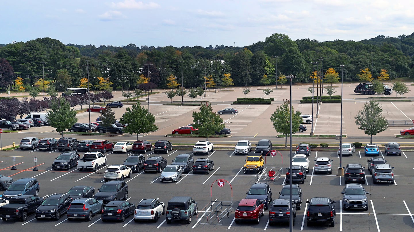 The site of ZOM Living's proposed housing development on the parking lots behind Braintree's South Shore Plaza.