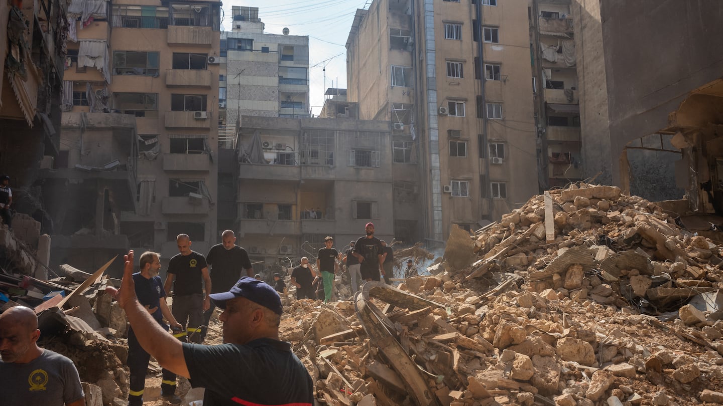 Lebanese Civil Defense working on a destroyed site following the Israeli attacks during the night of October 11th in Basta, Beirut.