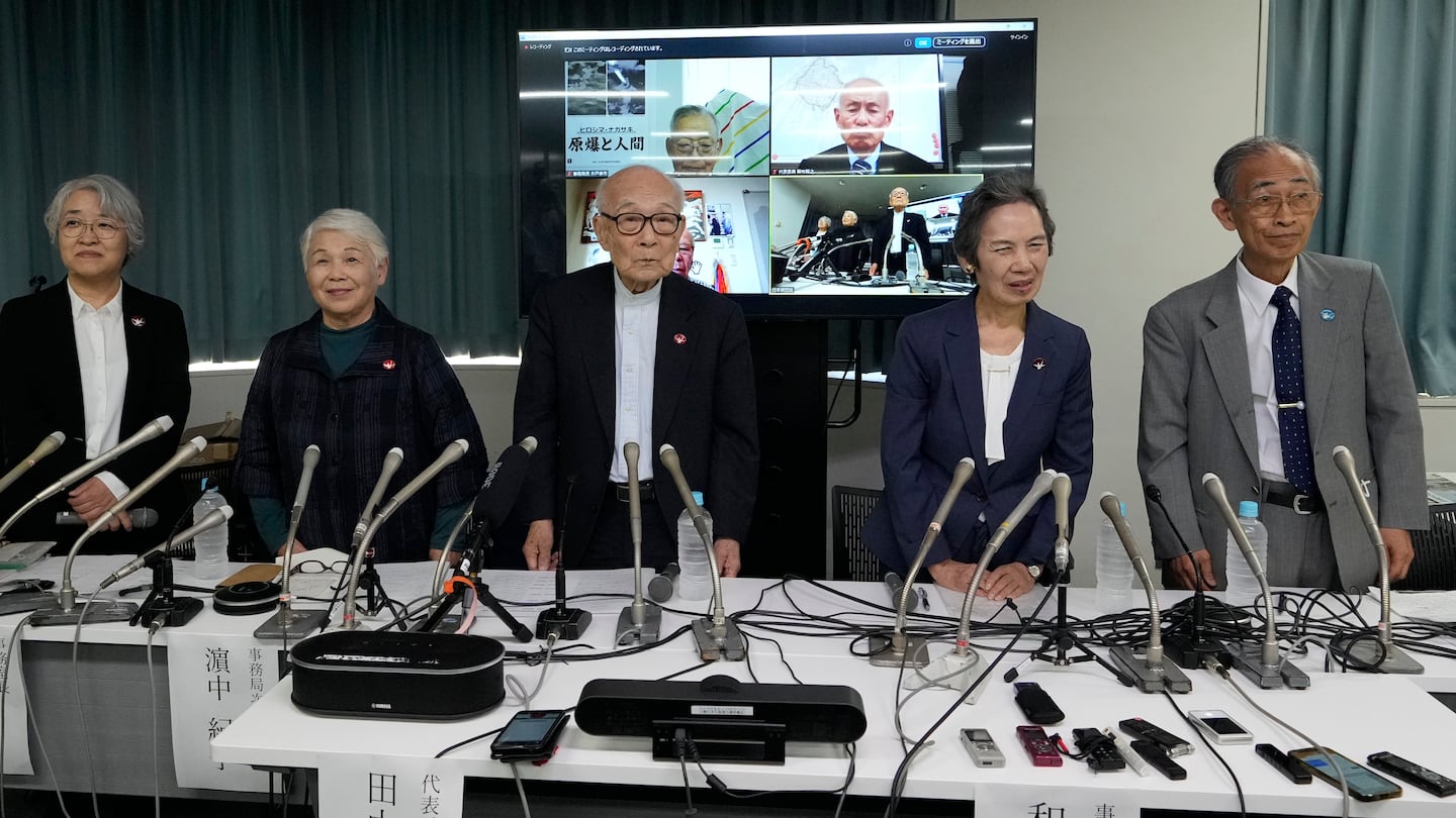 Terumi Tanaka, center, co-chairperson of Nihon Hidankyo and other senior members attend a press conference in Tokyo, on Oct. 12, a day after Nihon Hidankyo, an organization of survivors of the two U.S. atomic bombings, won the Nobel Peace Prize. Other members from second left to right, assistant Secretary Generals Toshiko Hamanaka, Masako Wada, and Jiro Hamasumi.