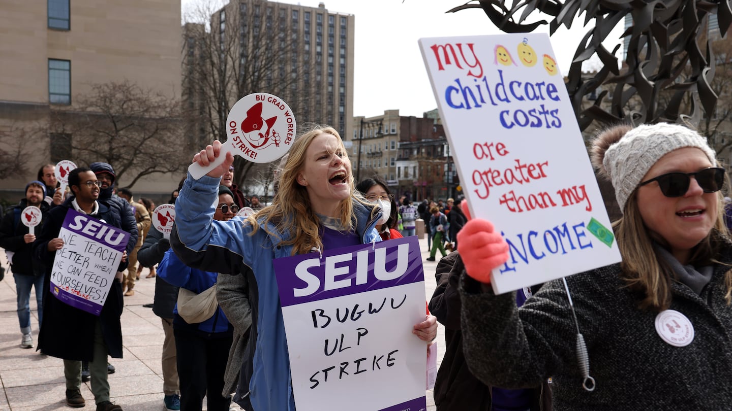 Anne Curtis, a graduate student at Boston University (center), rallied along with fellow grad students and allies as BU graduate worker students went on strike for fair pay, better health care coverage, and stronger benefits.