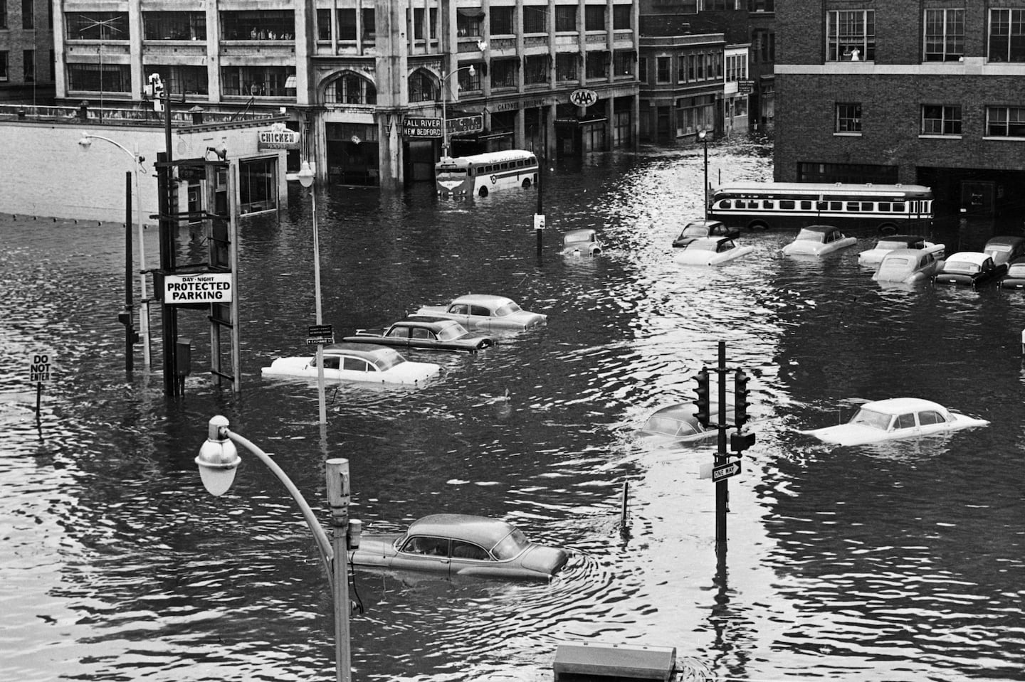 Providence suffered great damage when Hurricane Carol hit New England in 1954. Cars were surrounded by flood waters near Union Station.