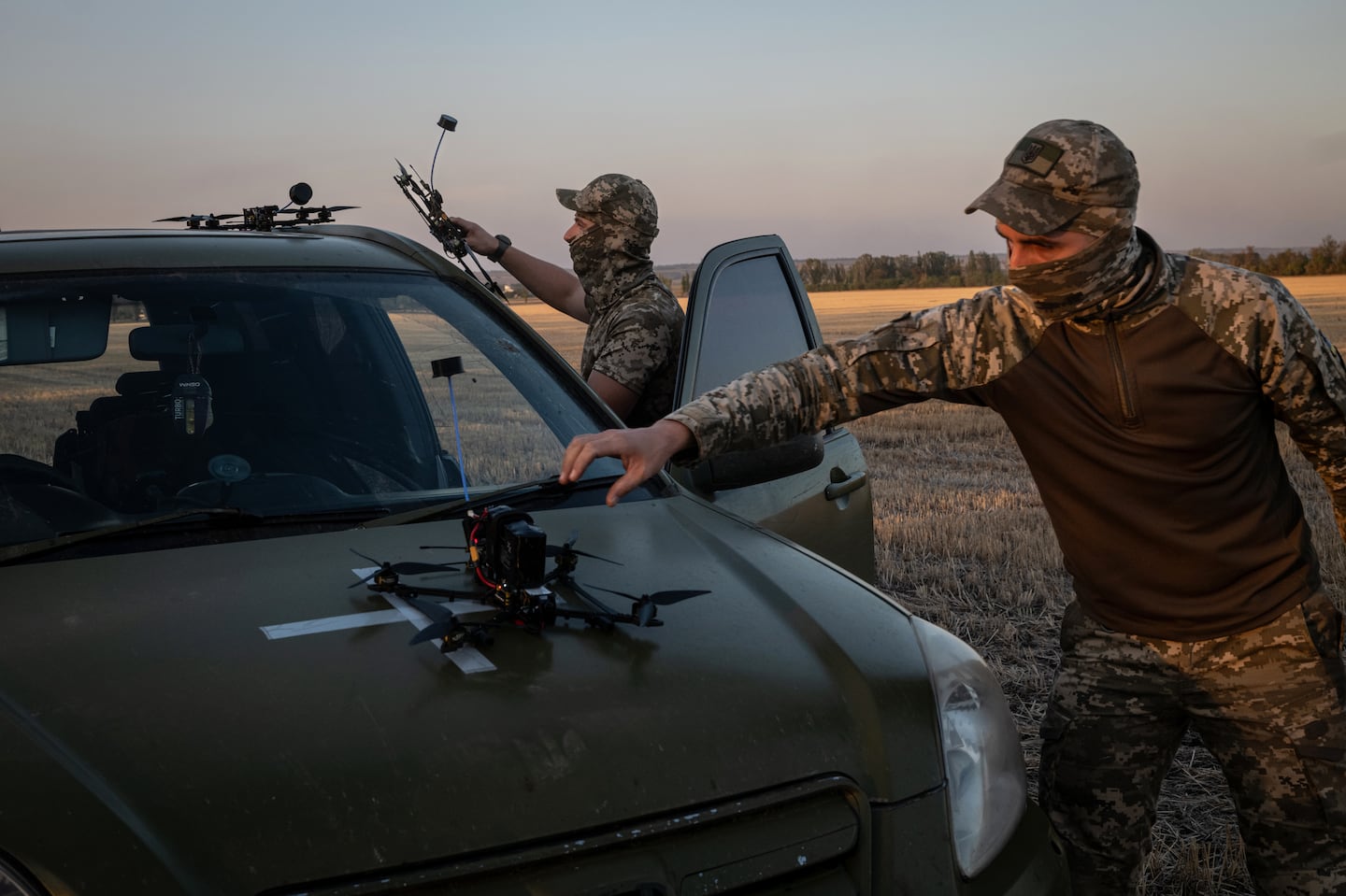 Ukrainian drone operators prepared to test a new drone in Donetsk region, Ukraine, last month. Drones are getting another new twist: Soldiers attach canisters to them to create weapons capable of spitting out molten metal that burns at 4,400 degrees.