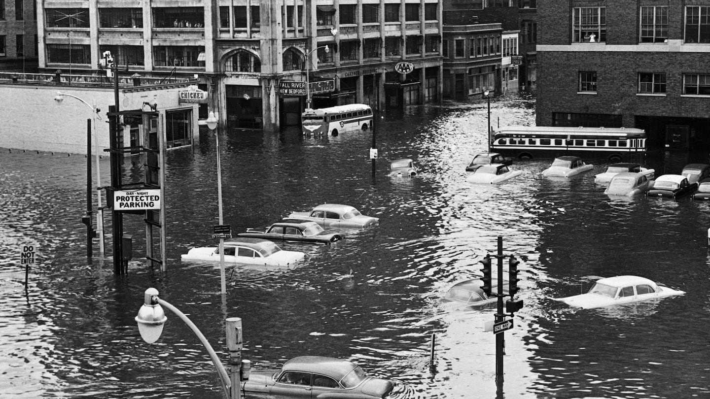 Providence suffered great damage when Hurricane Carol hit New England in 1954. Cars were surrounded by flood waters near Union Station.