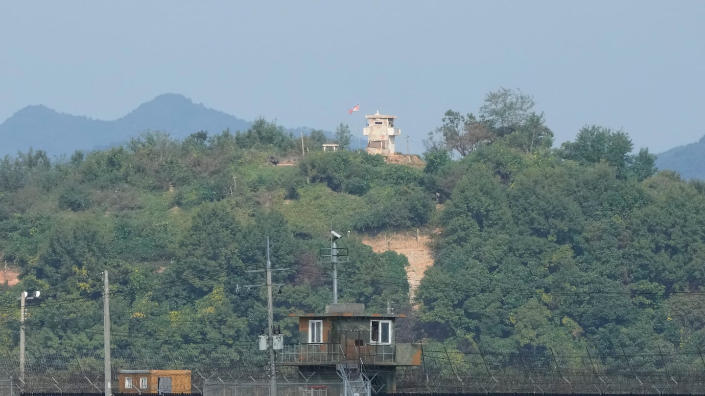 A North Korean military guard post, top, and a South Korean post, bottom, are seen from Paju, South Korea, near the border with North Korea, on Oct. 10.