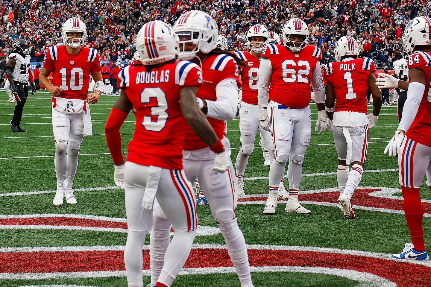 Thanks to Drake Maye (10), second-year wide receiver DeMario Douglas (3) could finally enjoy his first NFL touchdown celebration.