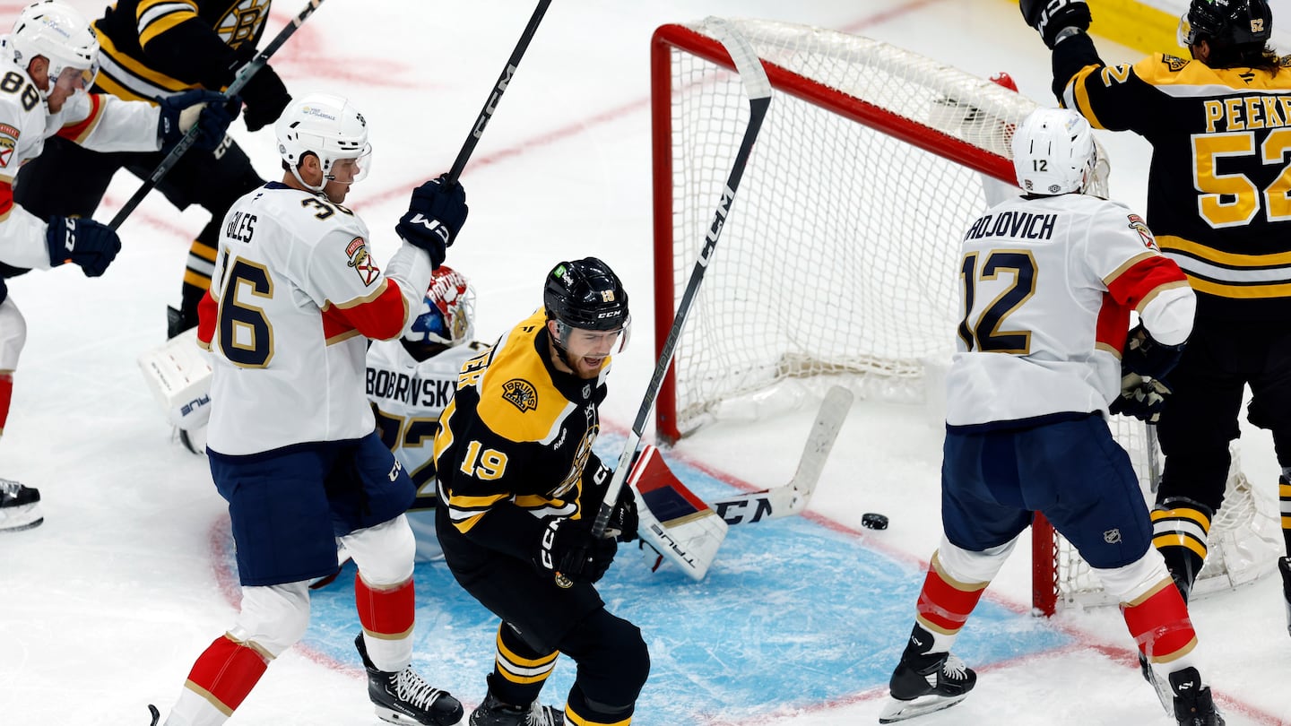 Johnny Beecher (center) gave the Bruins an early lead over the Panthers with his first goal of the season.