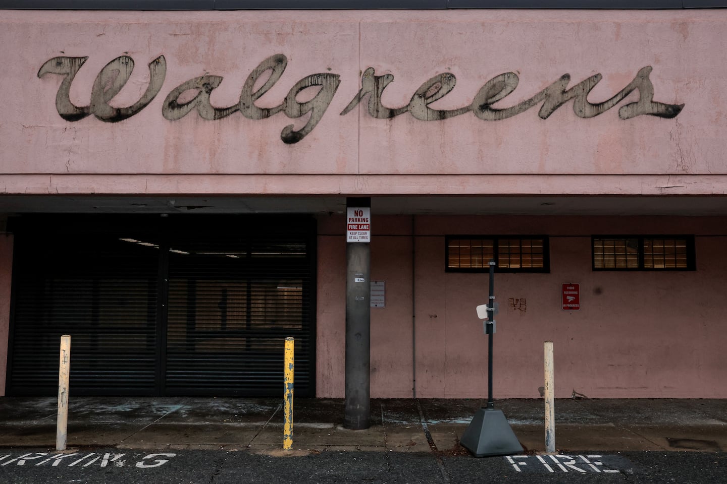 Signage from a closed Walgreens in Roxbury in February, 2024. 