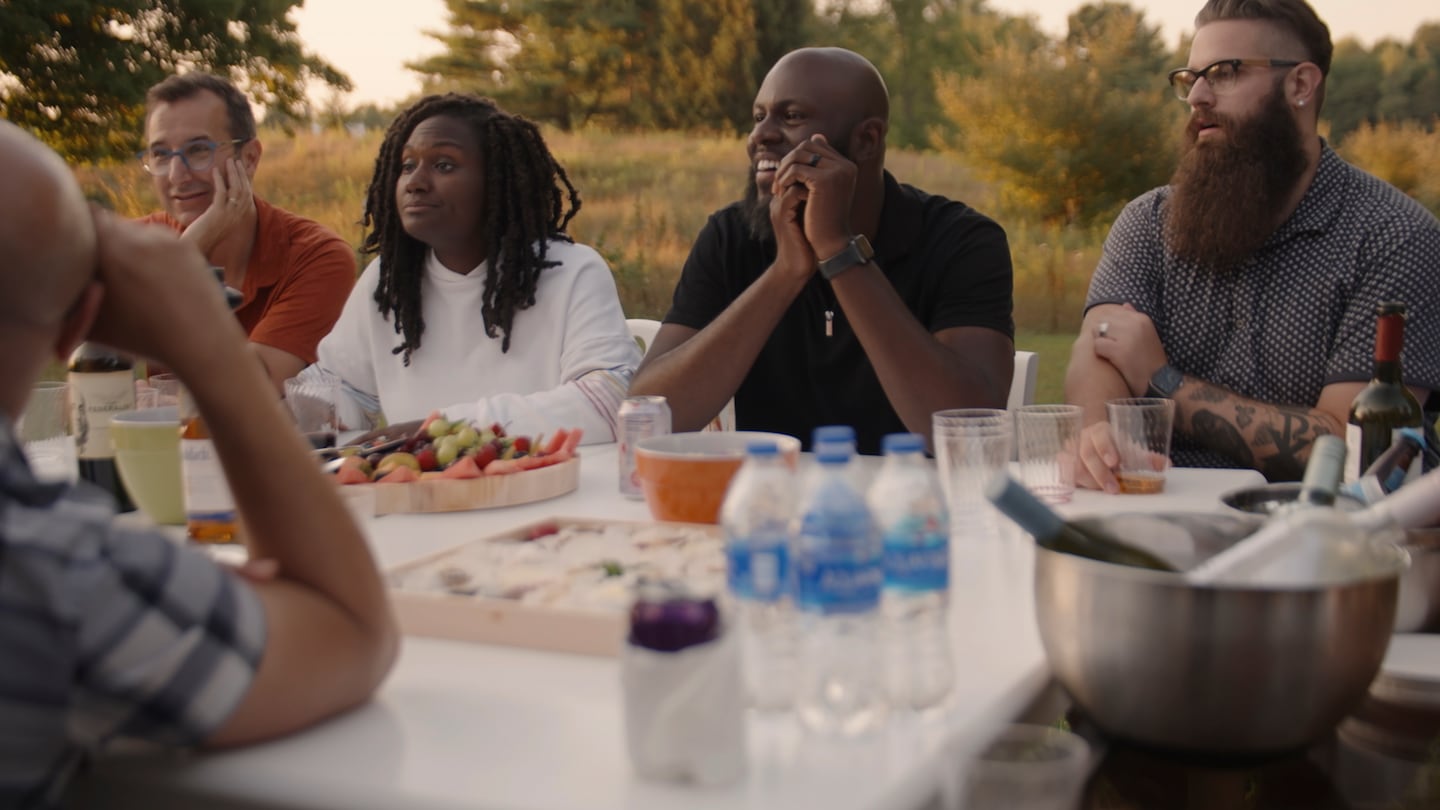 Pastors Michael Gulker, Ashlee Eiland, Chase Stancle, and Ben Kampmeier gather for a meal during the filming of "Leap of Faith."