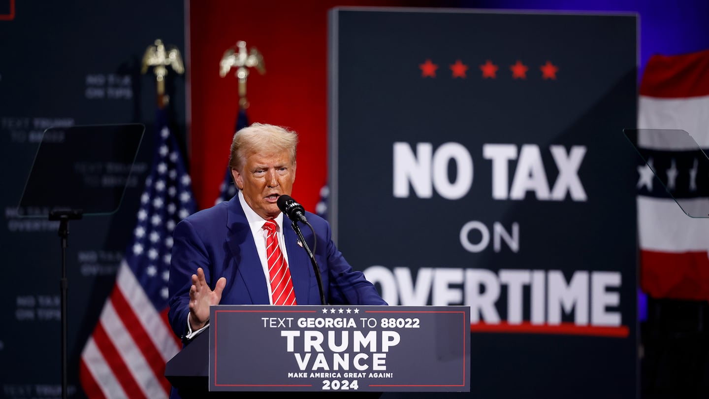 Republican presidential nominee, former president Donald Trump delivers remarks during a campaign rally at the Cobb Energy Performing Arts Centre on Oct. 15, 2024 in Atlanta, Ga.