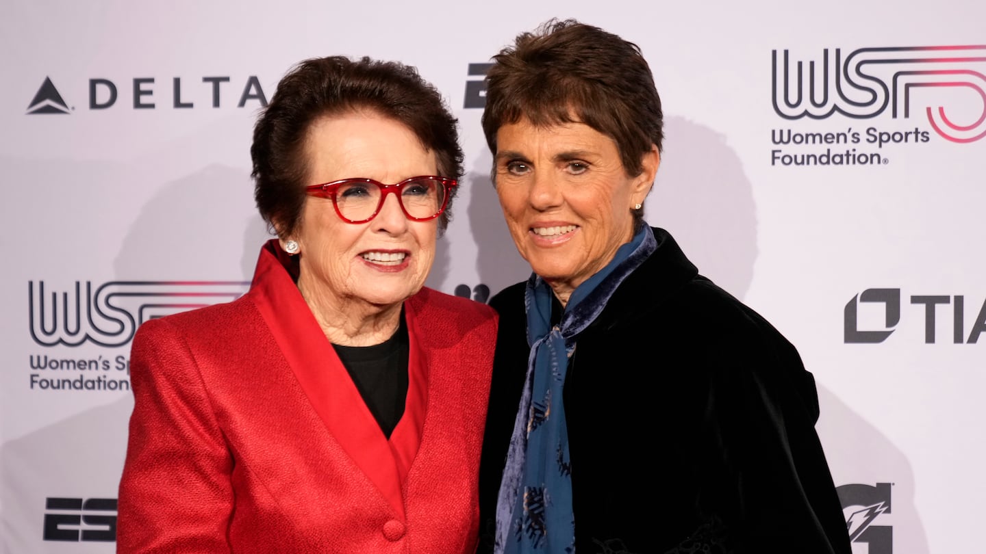 Billie Jean King, left, and Ilana Kloss, right, pose for photos on the red carpet at the Women's Sports Foundation's Annual Salute to Women in Sports, on Oct. 16, in New York.