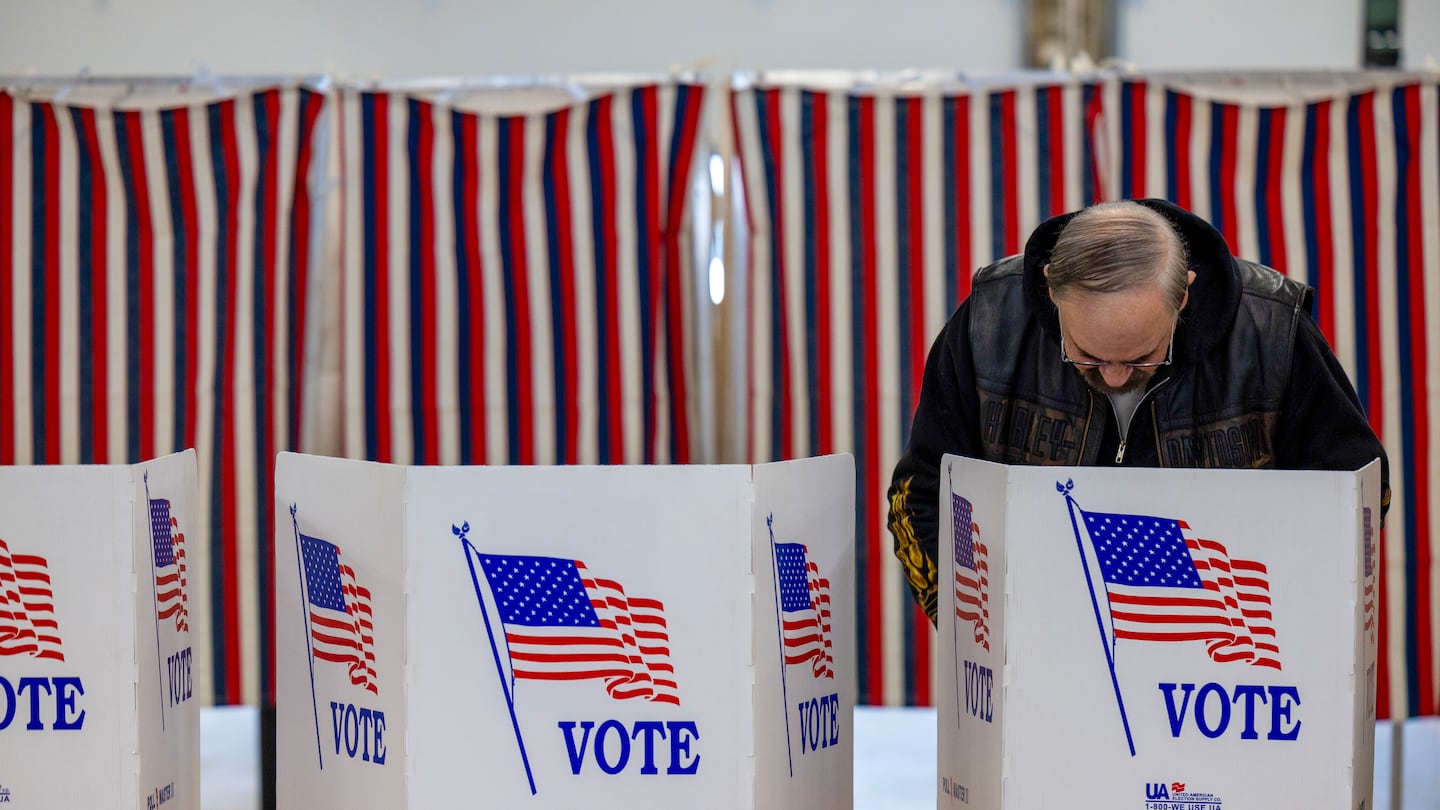 A voter fills out a ballot in Loudon, N.H., in January.