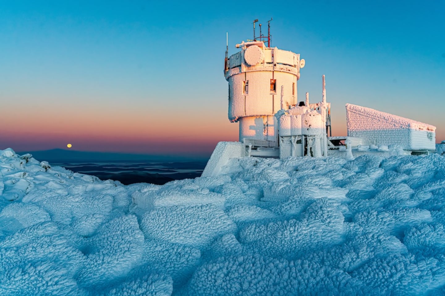 Rime ice and snow cover the observatory tower at the Mount Washington Observatory in New Hampshire Thursday morning.