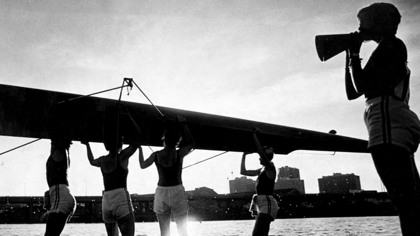 Members of the Cornell women's eight crew put up their shell and called it a day after participating in the Head of the Charles Regatta on Oct. 22, 1978.