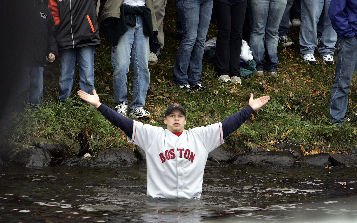 This Red Sox fan, appearing to be baptized in the Charles River, represented countless others who felt reborn when the team ended its championship drought in 2004.