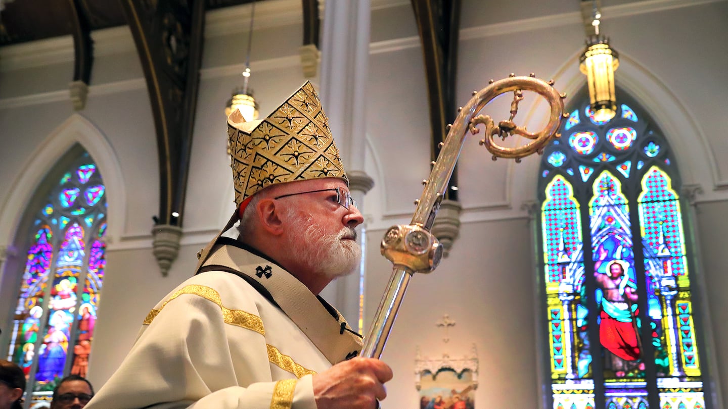 Cardinal Sean P. O’Malley followed the procession down the center aisle at the start of the ordination in May at the Cathedral of the Holy Cross.