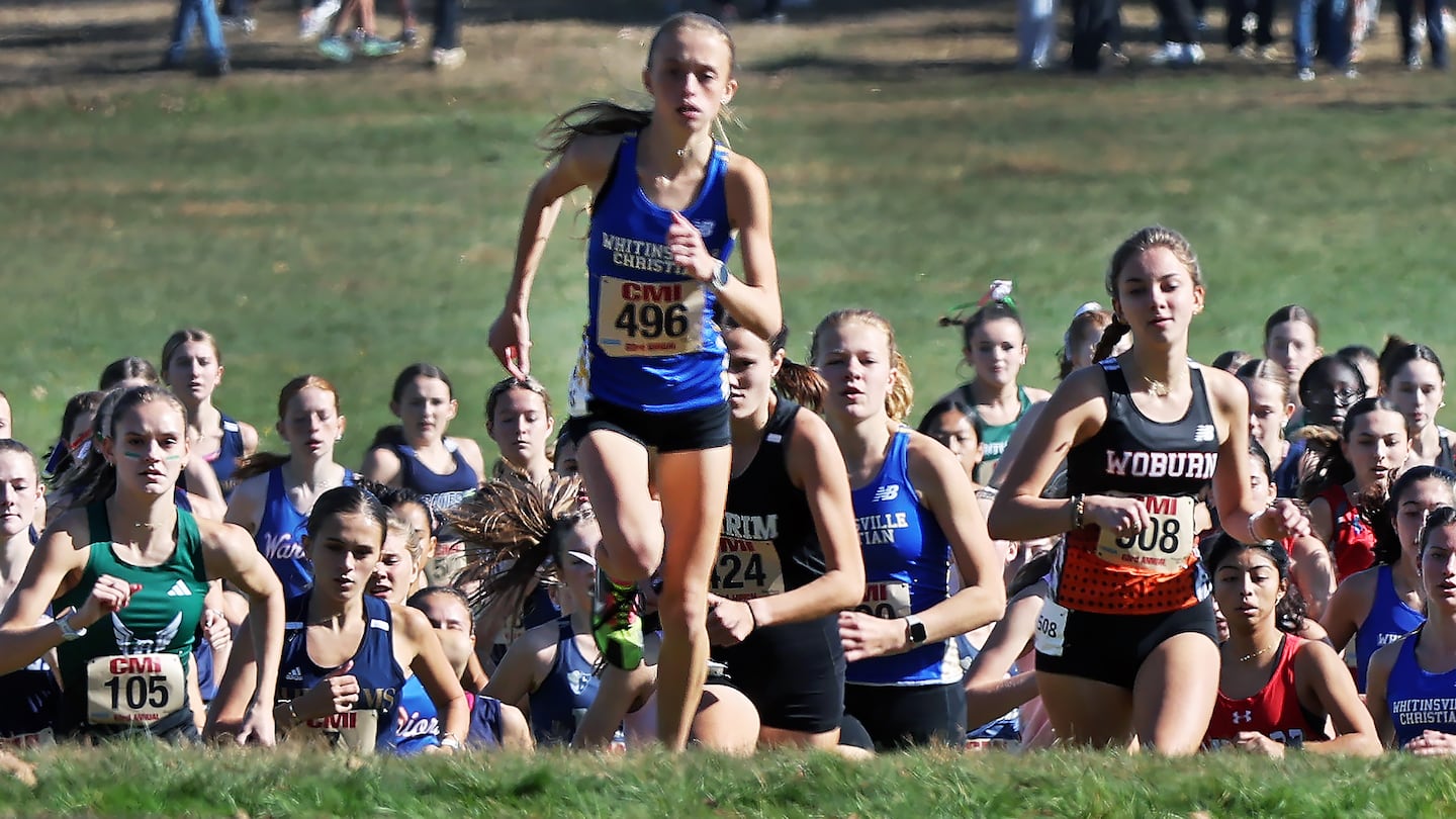 As the runners came up the first hill of the varsity girls' 5K race at the 63rd Catholic Memorial Invitational, Whitinsville Christian's Emily Flagg was already on firm footing with the lead at Franklin Park.