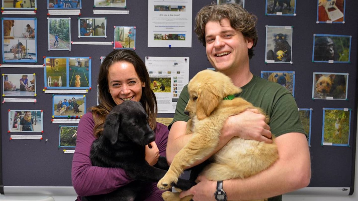 Coauthors of "Puppy Kindergarten" Vanessa Woods and Brian Hare.