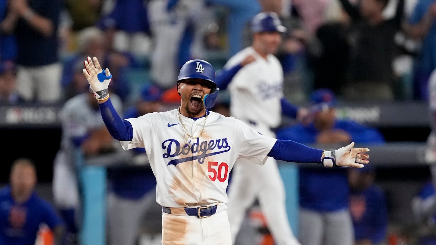 Mookie Betts doubled during the Dodgers' three-run eighth inning, the insurance runs in a 10-5 victory that clinched a World Series meeting between the best regular-season team in each league.