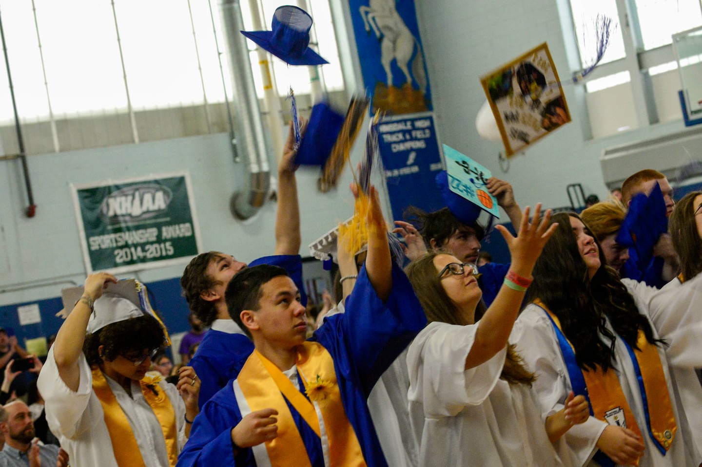 Graduation requirements vary greatly by state. In New Hampshire districts like Hindsdale, students have to complete more than a dozen credits and pass a school-administered civics test.