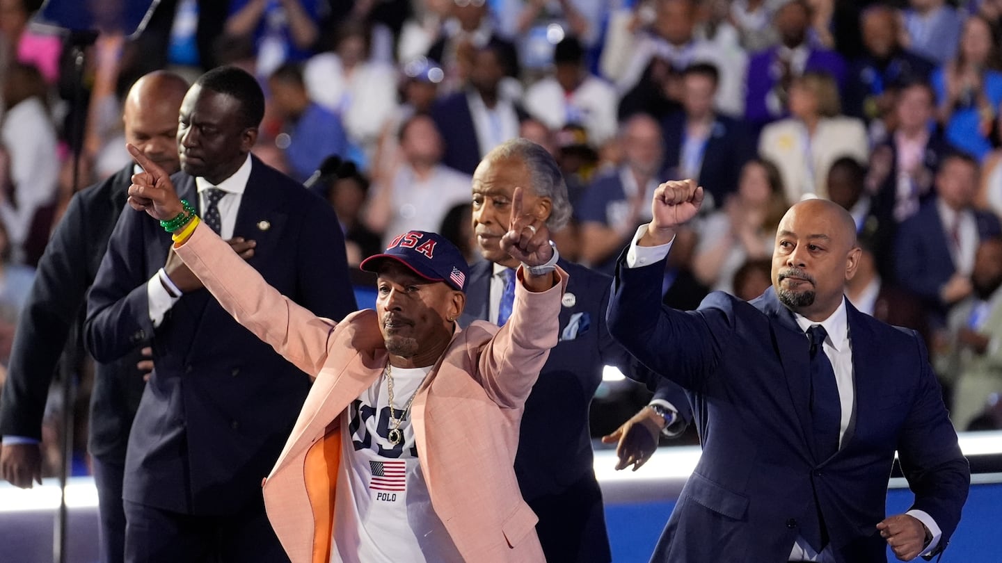 The Central Park Five join Reverend Al Sharpton during the Democratic National Convention, Aug. 22, 2024, in Chicago.