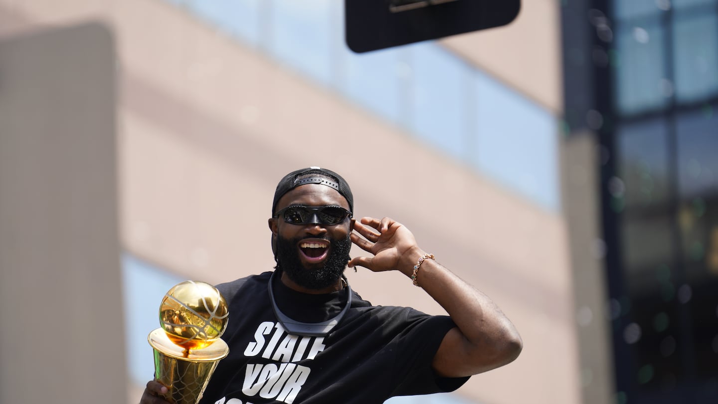 Jaylen Brown wore a custom "state your source" shirt to the Celtics championship parade.