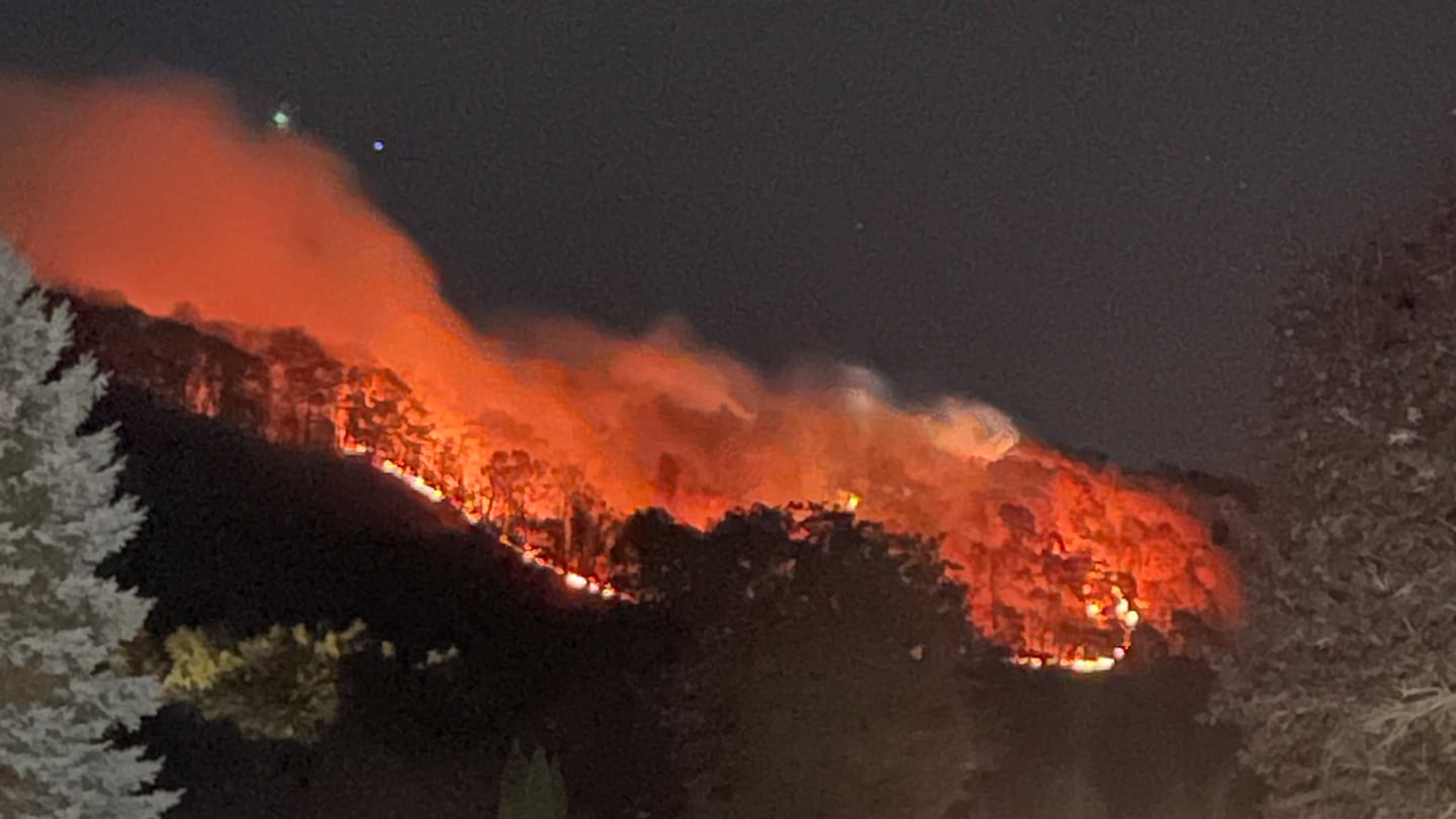 A forest fire is seen on Lamentation Mountain in Berlin, Conn., Monday night.