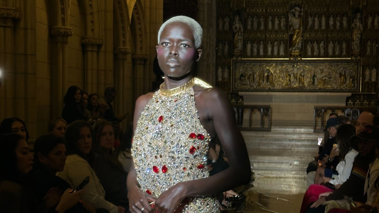 A model walks at a show for Boston Fashion Week.