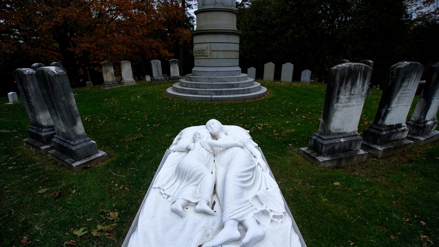 The Sprague lot containing “the sarcophagus with the giant figures memorializing the two elder children of Byron and Harriet Sprague,” at Swan Point Cemetery, in Providence.