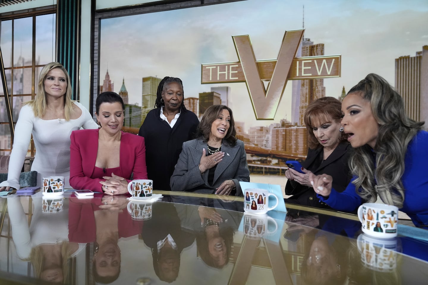 Democratic presidential nominee Vice President Kamala Harris chats with the hosts during a commercial break at The View, Tuesday, Oct. 8, 2024, in New York.