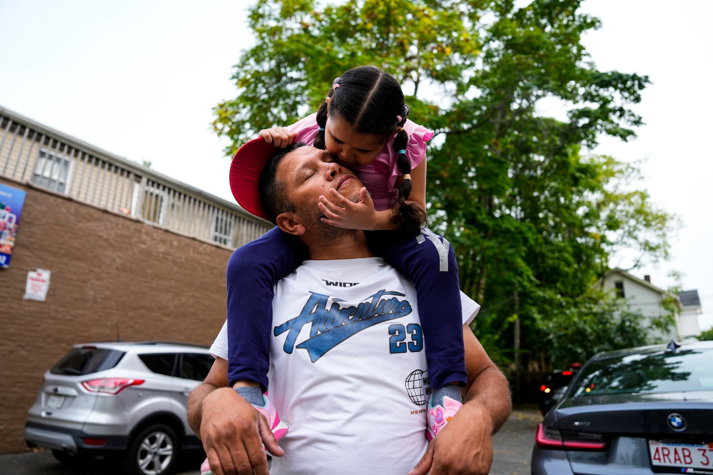 Luissiana Colmenarez Sabedra kissed her dad, Jose Luis Colmenarez Apostol, after arriving home from school outside their apartment in West Springfield.