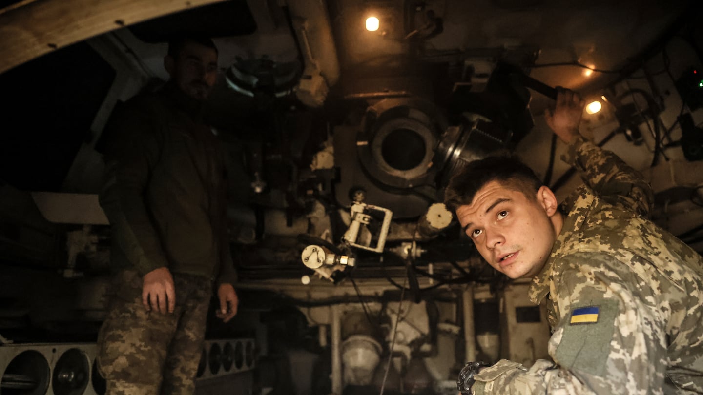 In this photo provided by Ukraine's 24th Mechanised Brigade press service, Ukrainian soldiers are seen inside a M109 self-propelled howitzer on the frontline on their position in Chasiv Yar, Donetsk region, Ukraine, Wednesday, Oct. 23, 2024.