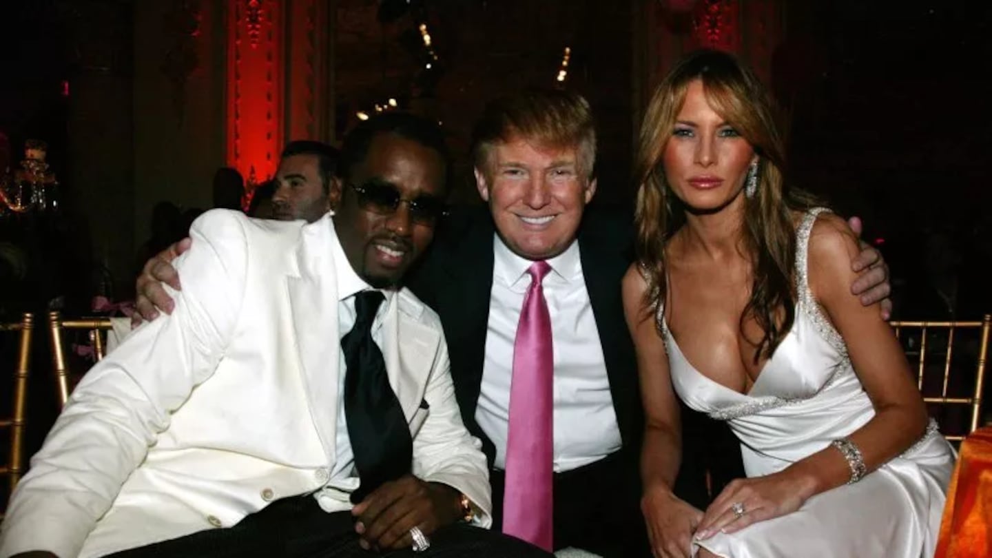 Sean “Diddy” Combs” with Donald and Melania Trump at the Art for Life gala in 2005.