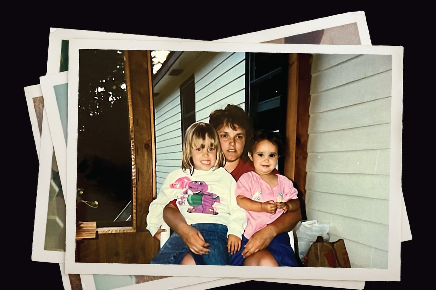 Lee Ann Daigle with her daughters Lauryn (left) and Kristyn (right) at their home in Litchfield, New Hampshire, in an undated photo.