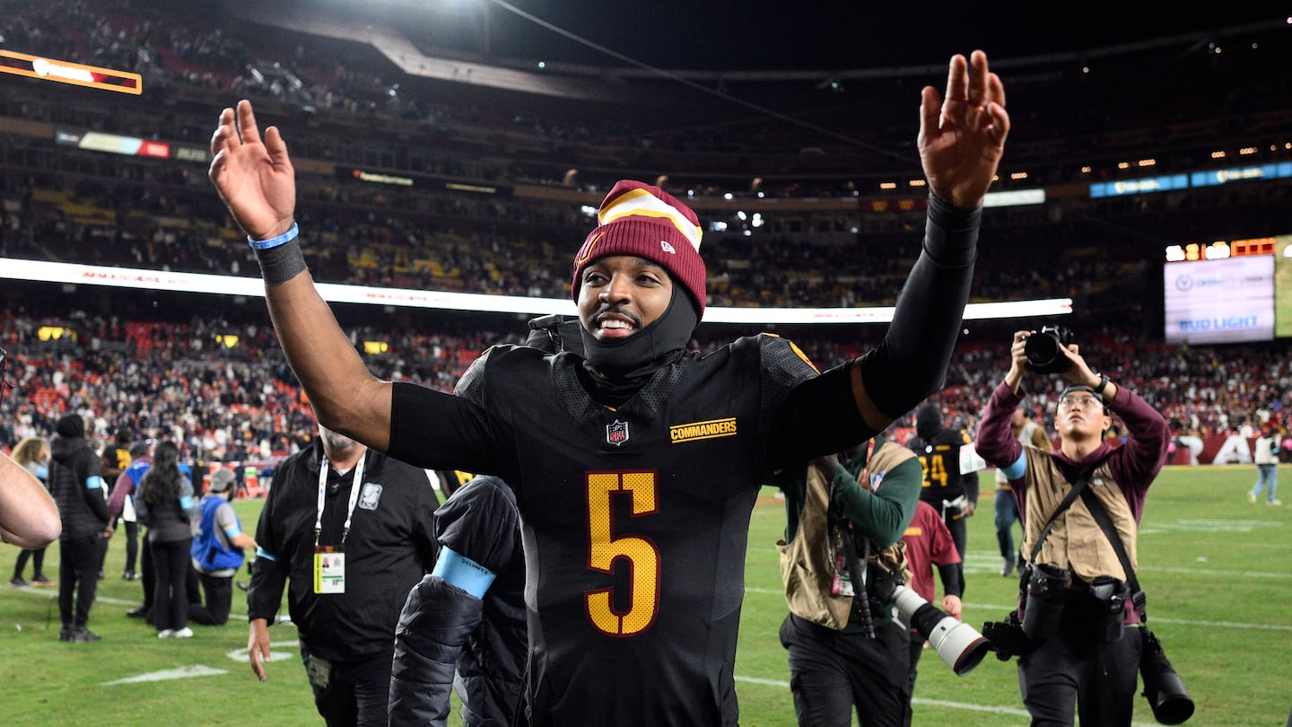 Washington quarterback Jayden Daniels walked off the field a happy man after clicking on a last-second touchdown heave.