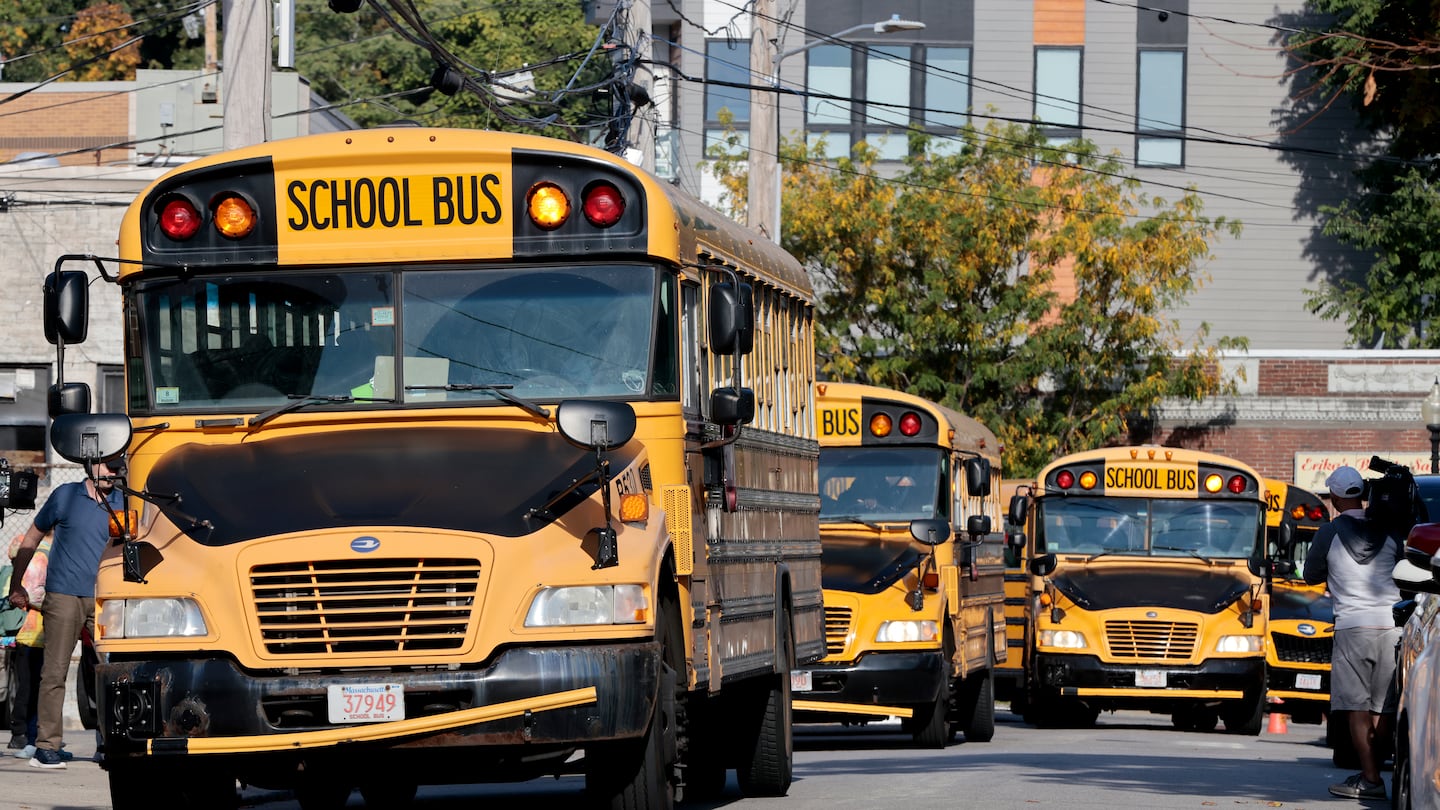 Buses stacked up next to Sumner Elementary School in Boston in September.