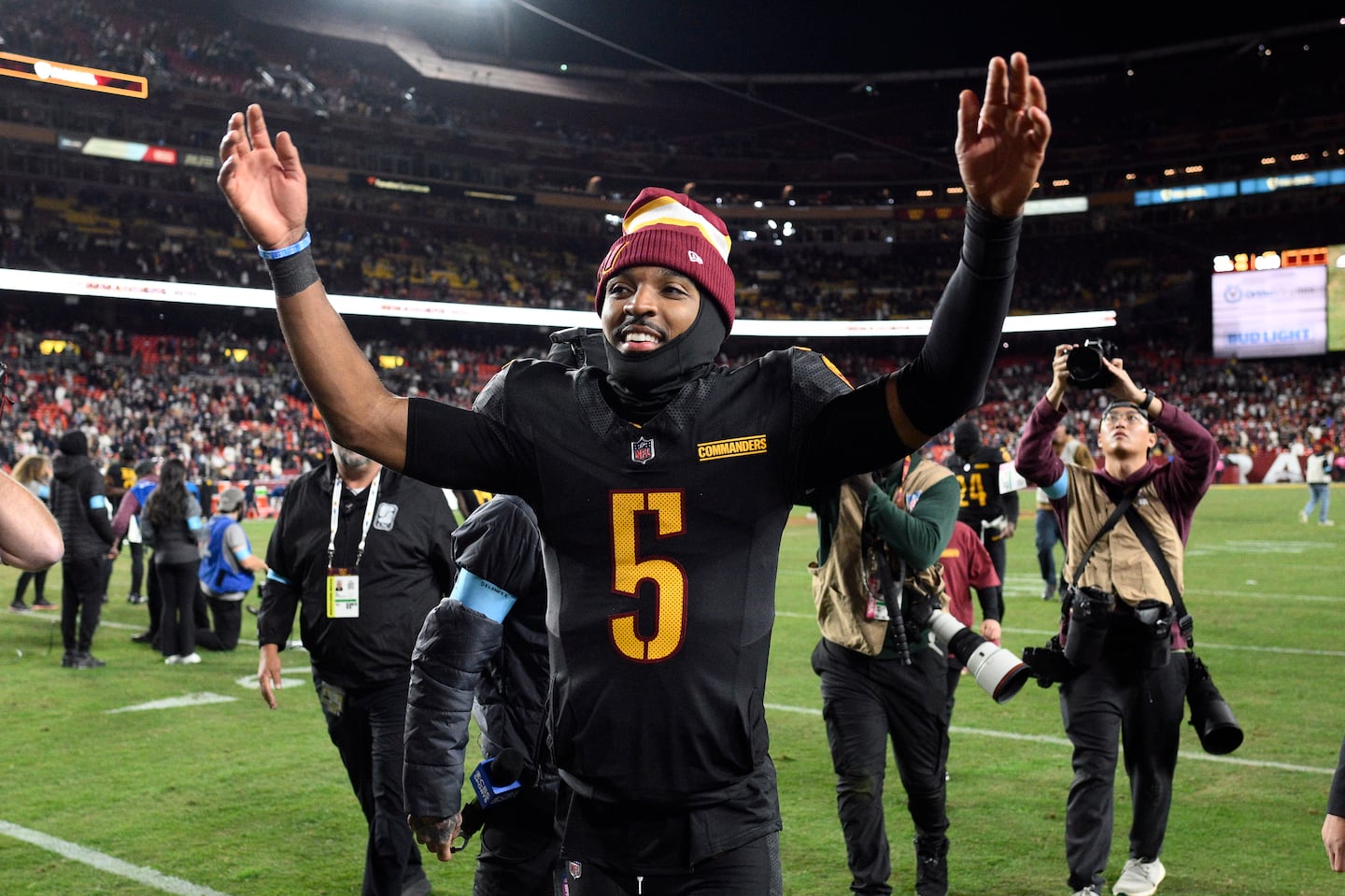 Washington quarterback Jayden Daniels walked off the field a happy man after clicking on a last-second touchdown heave.