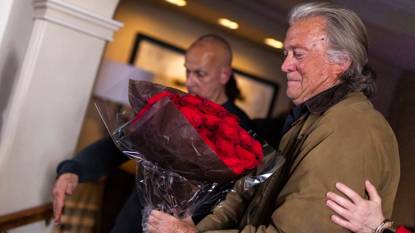 Steve Bannon received flowers at the end of a press conference after being released from the Federal Correctional Institution Danbury on Tuesday.