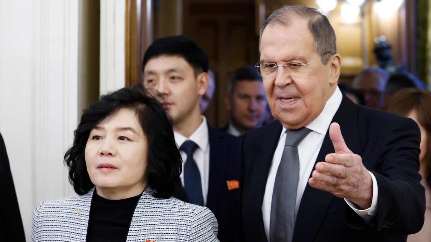 Russian Foreign Minister Sergey Lavrov, right, and North Korean Foreign Minister Choe Son Hui enter a hall for their talks in Moscow, Russia, on Jan. 16.