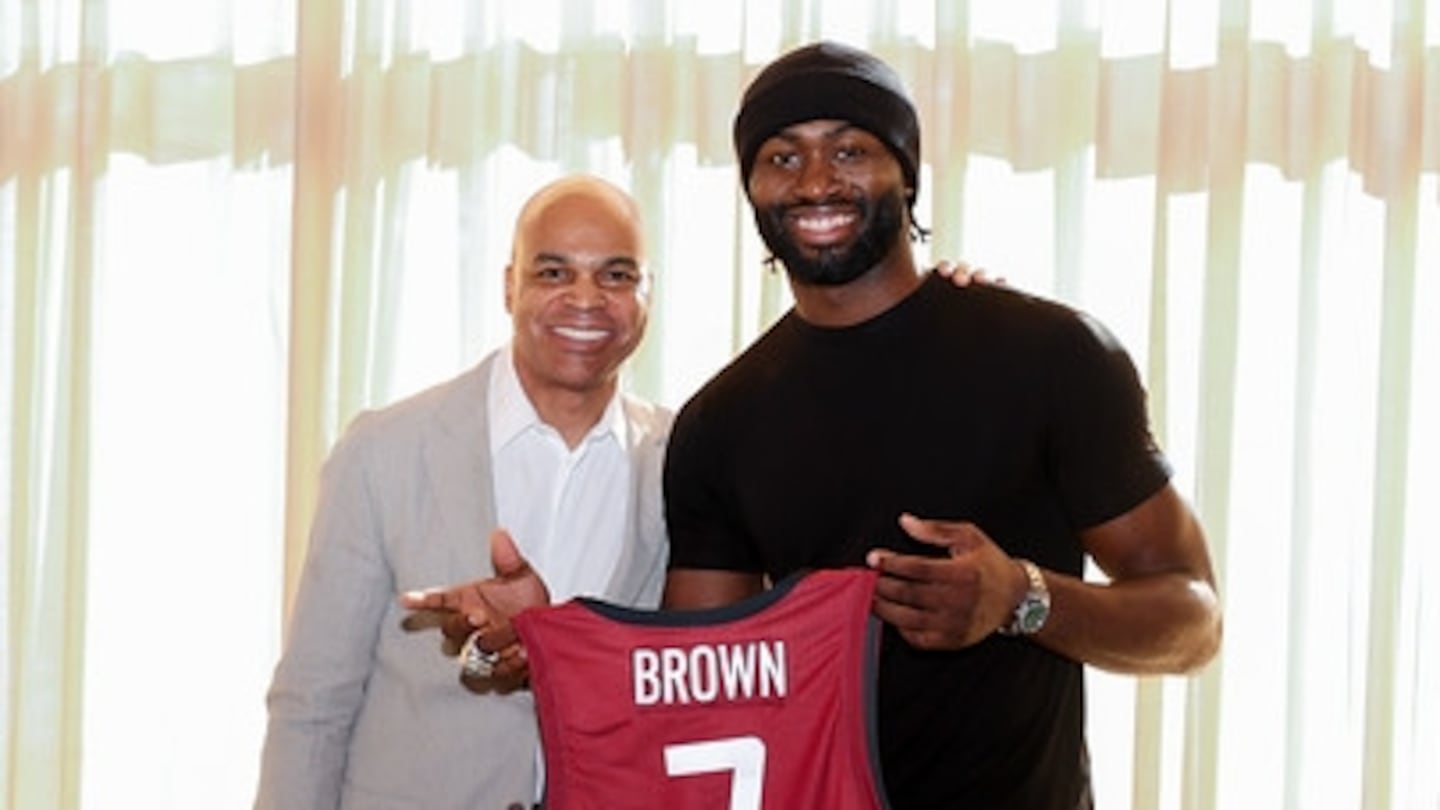 Celtics' Jaylen Brown (right) with Harvard coach Tommy Amaker at the Breakfast Club meeting earlier this month.