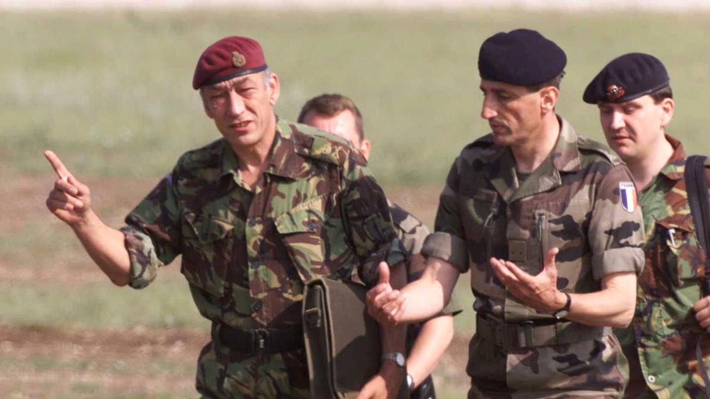 General Jackson (left) conferred with the commander of French NATO troops in Macedonia, General Bruno Cuche, as they arrived at a NATO military base near Skopje, Macedonia, in 1999, for talks with Yugoslav representatives.