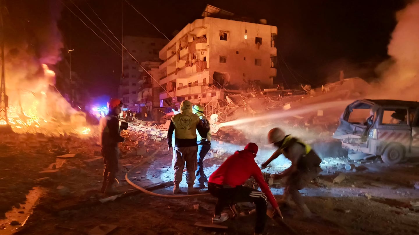 First responders battled flames following an Israeli airstrike that targeted the industrial zone in the southern Lebanese village of Abbasiyeh near Tyre on Wednesday.