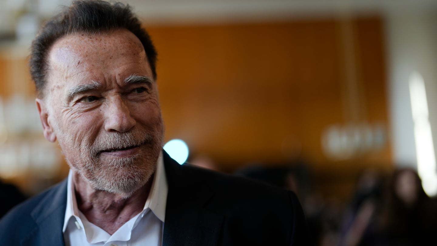 Former California Governor and actor Arnold Schwarzenegger arrives for a ceremony to receive a honorary doctorate by the Hertie School, a university of governance, in Berlin, Germany, Tuesday, Sept. 17, 2024. (AP Photo/Markus Schreiber)