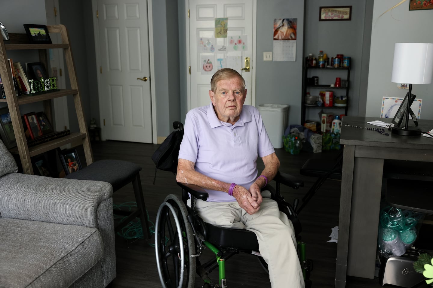 Jack MacMaster posed for a portrait inside his apartment at Prospect House. MacMaster is a plaintiff in a lawsuit alleging a Revere assisted living facility has been concocting bogus fees to drain the bank accounts of residents.Jessica