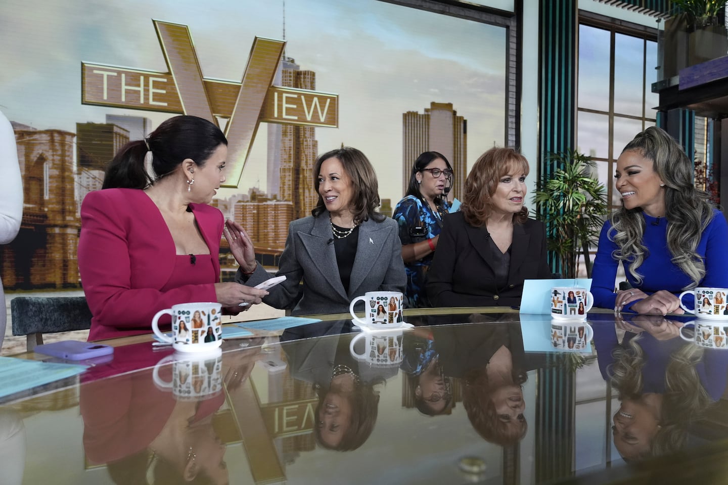 Democratic presidential nominee Vice President Kamala Harris chats with the hosts during a commercial break at The View, Tuesday, Oct. 8, 2024, in New York.