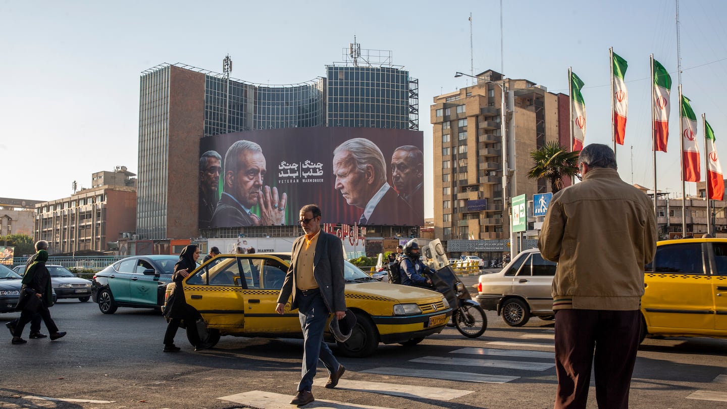 A new billboard depicts President Biden and Prime Minister Benjamin Netanyahu of Israel as “warmongers,” in Tehran, on Oct. 27.