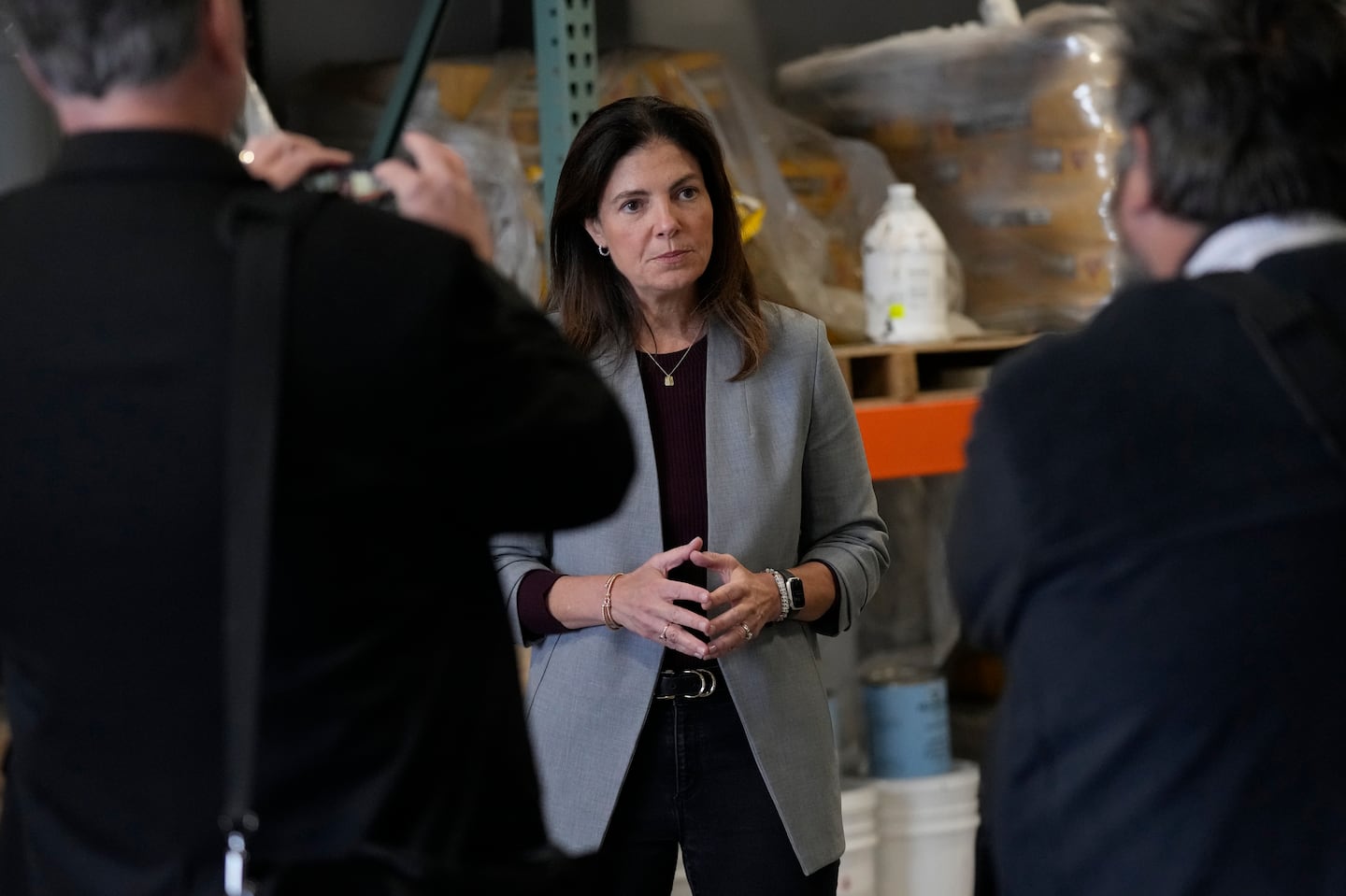 Republican gubernatorial candidate Kelly Ayotte, who faces Democrat Joyce Craig in the November 2024 election, during a visit to a concrete coating business in Manchester, N.H., in October.