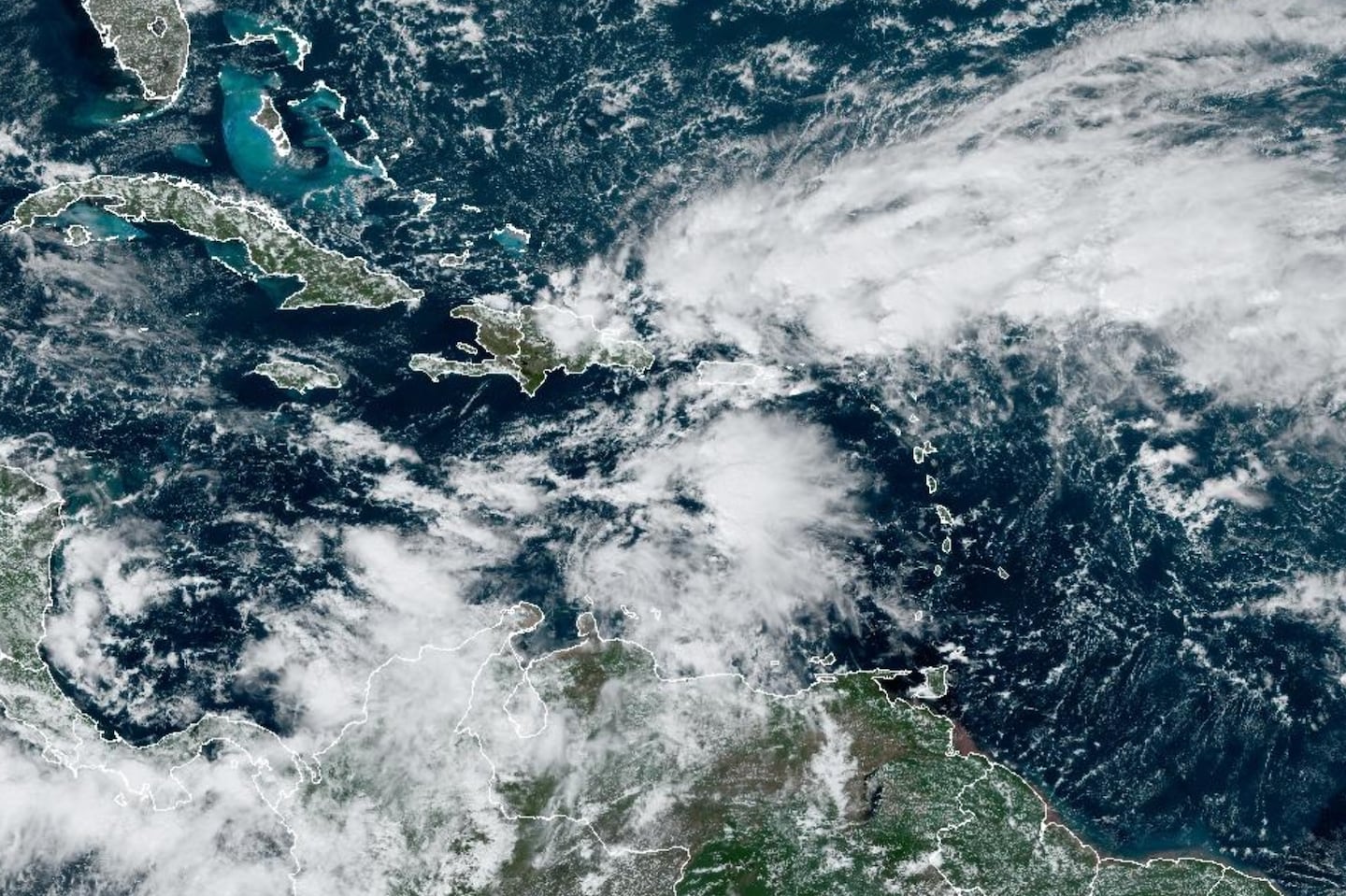 This satellite image captured Friday shows disturbances in the Caribbean.