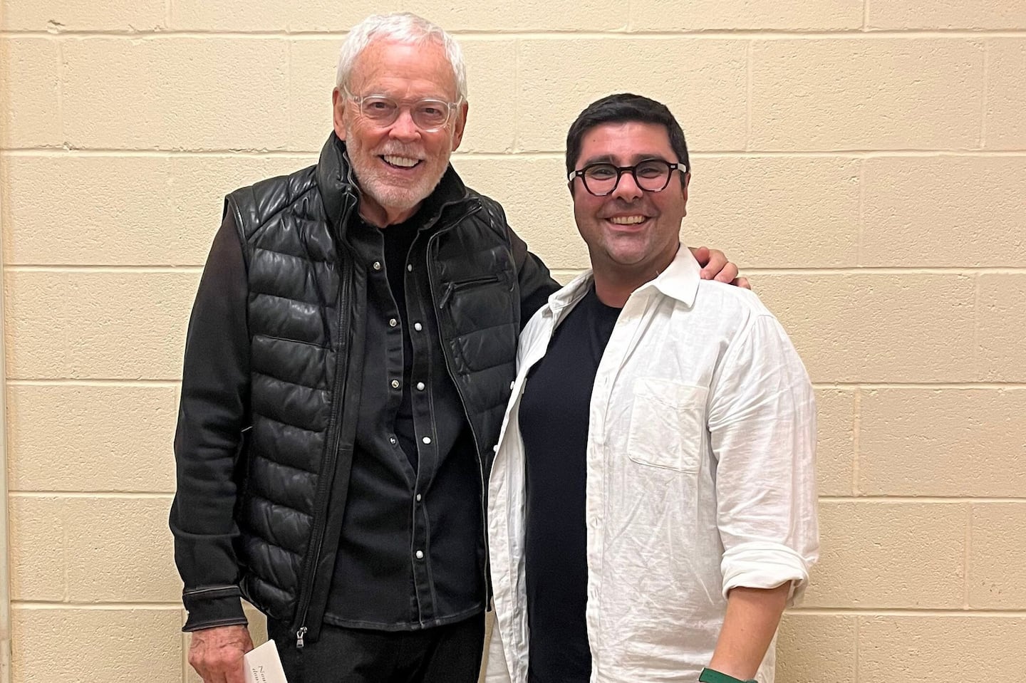 Former Celtics-announcer-turned-actor Mike Gorman with playwright Nassim Soleimanpour at the Huntington Theatre Company.