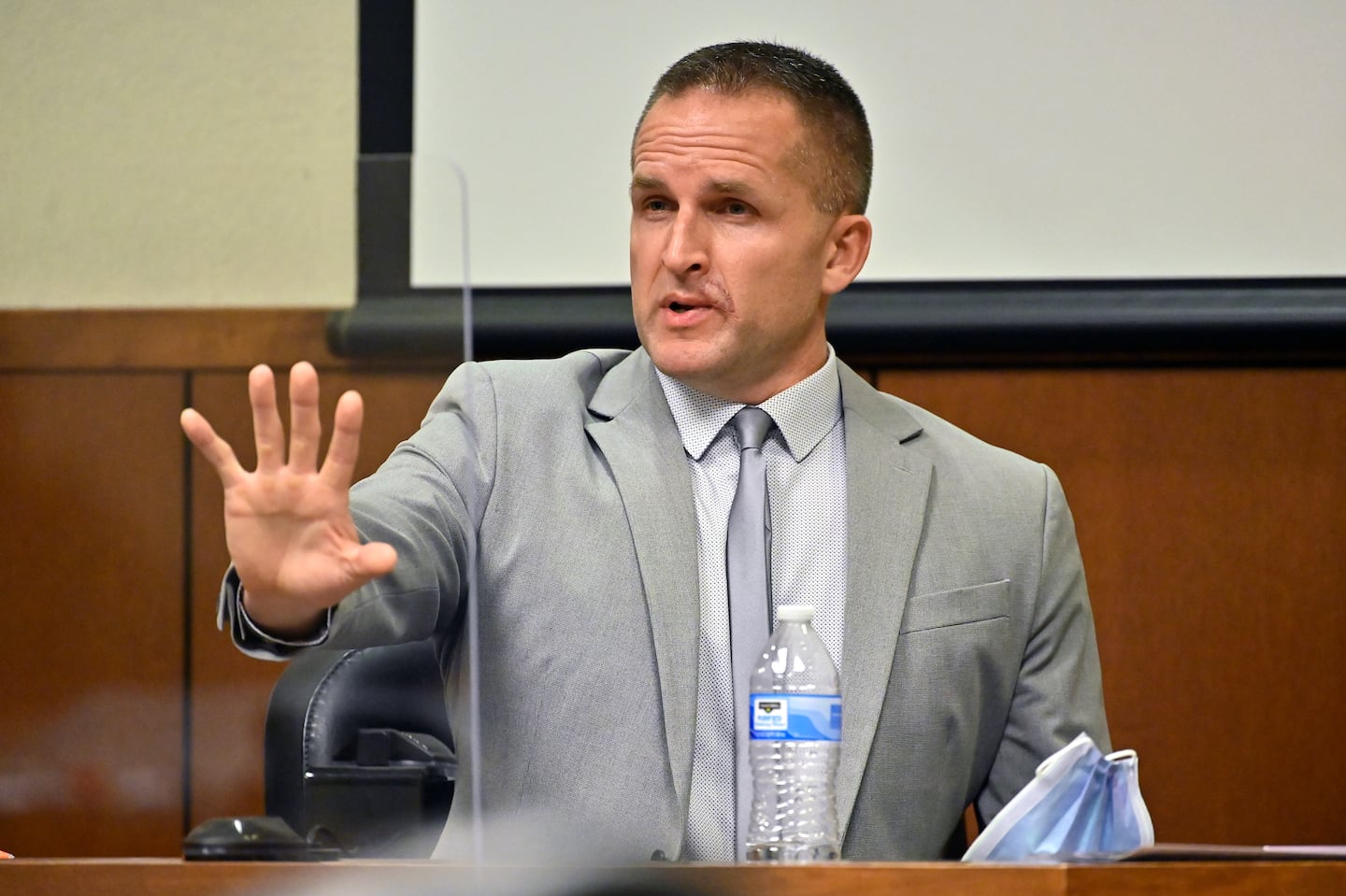 FILE - Former Louisville Police officer Brett Hankison is questioned by his defense attorney Wednesday, March 2, 2022, in Louisville, Ky.. (AP Photo/Timothy D. Easley, Pool, File)